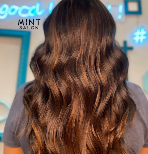 Professional unisex hair salon offering hair color near me